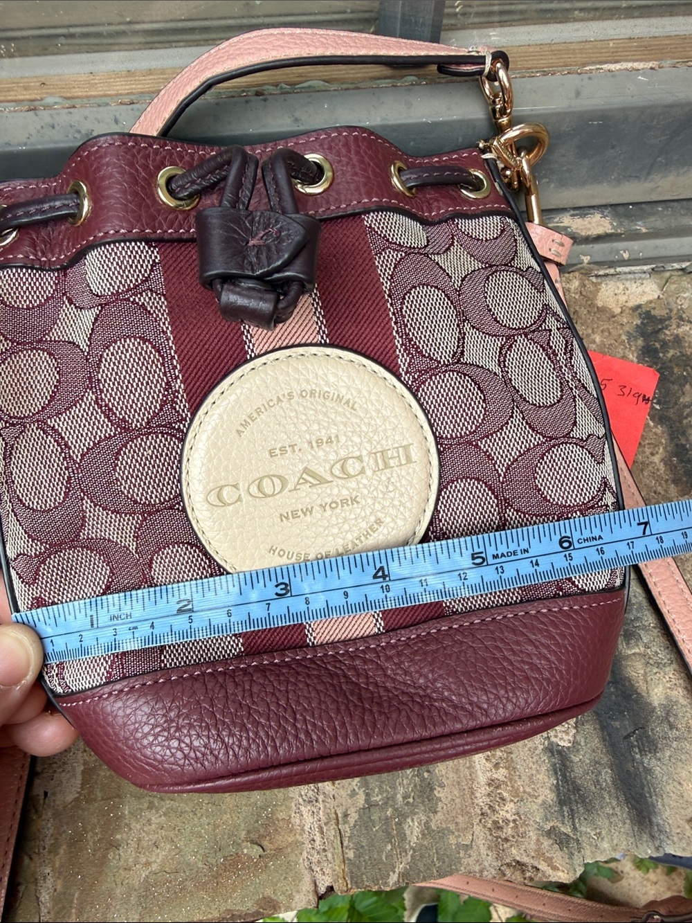 Coach Burgundy Signature Stripe Drawstring Crossbody with Cream Medallion - Picture 11 of 12